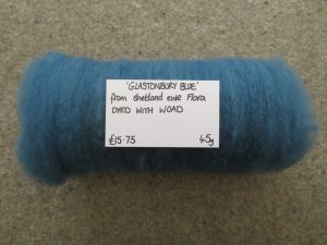 Carded blue batt rolled up