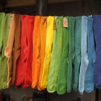 Hanging array of naturally dyed Exmoor Socks 13-14